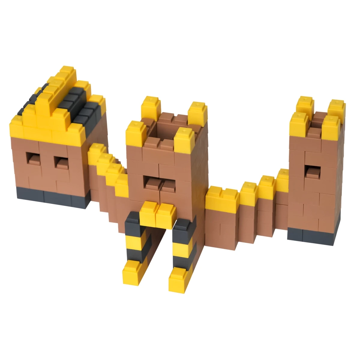 Zbliżenie na elementy zestawu Bricks — różnorodne klocki konstrukcyjne w kolorach brąz, żółć i czerń